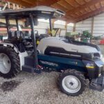 photo of a Monarch tractor sitting in an open bay equipment shed